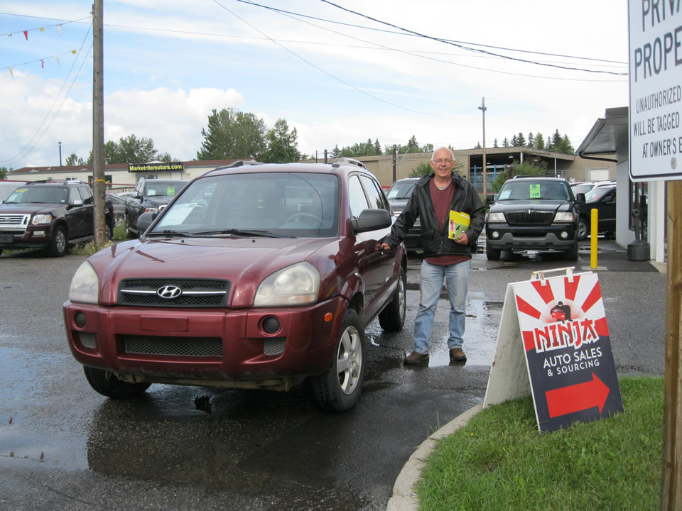 Mike with his new Hyundai Santa Fe