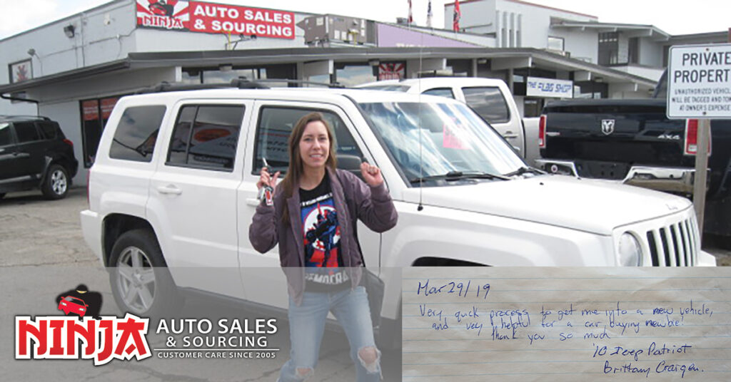 Brittany with her new Jeep Patriot